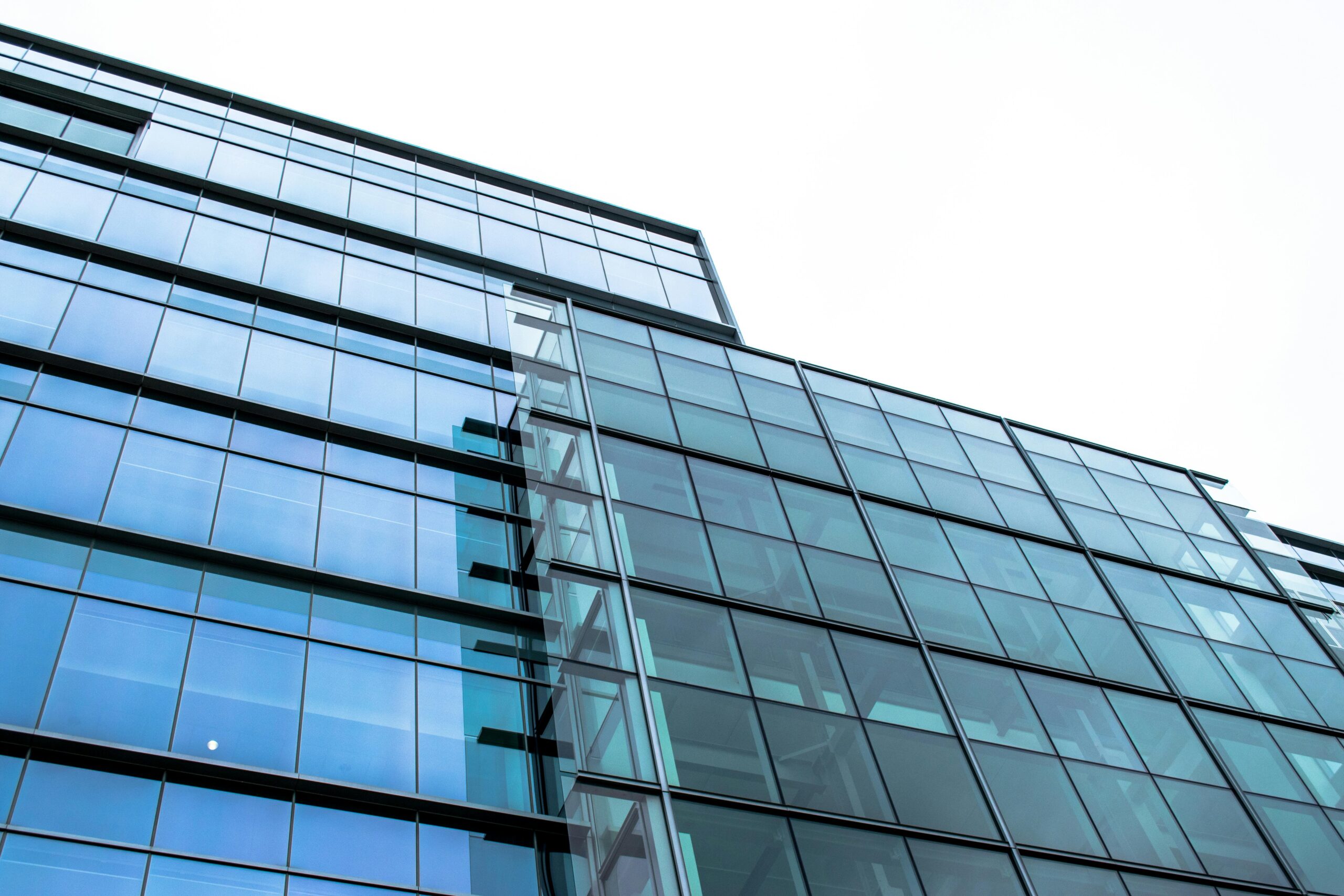 a glass building image used for an article about women as directors of boards