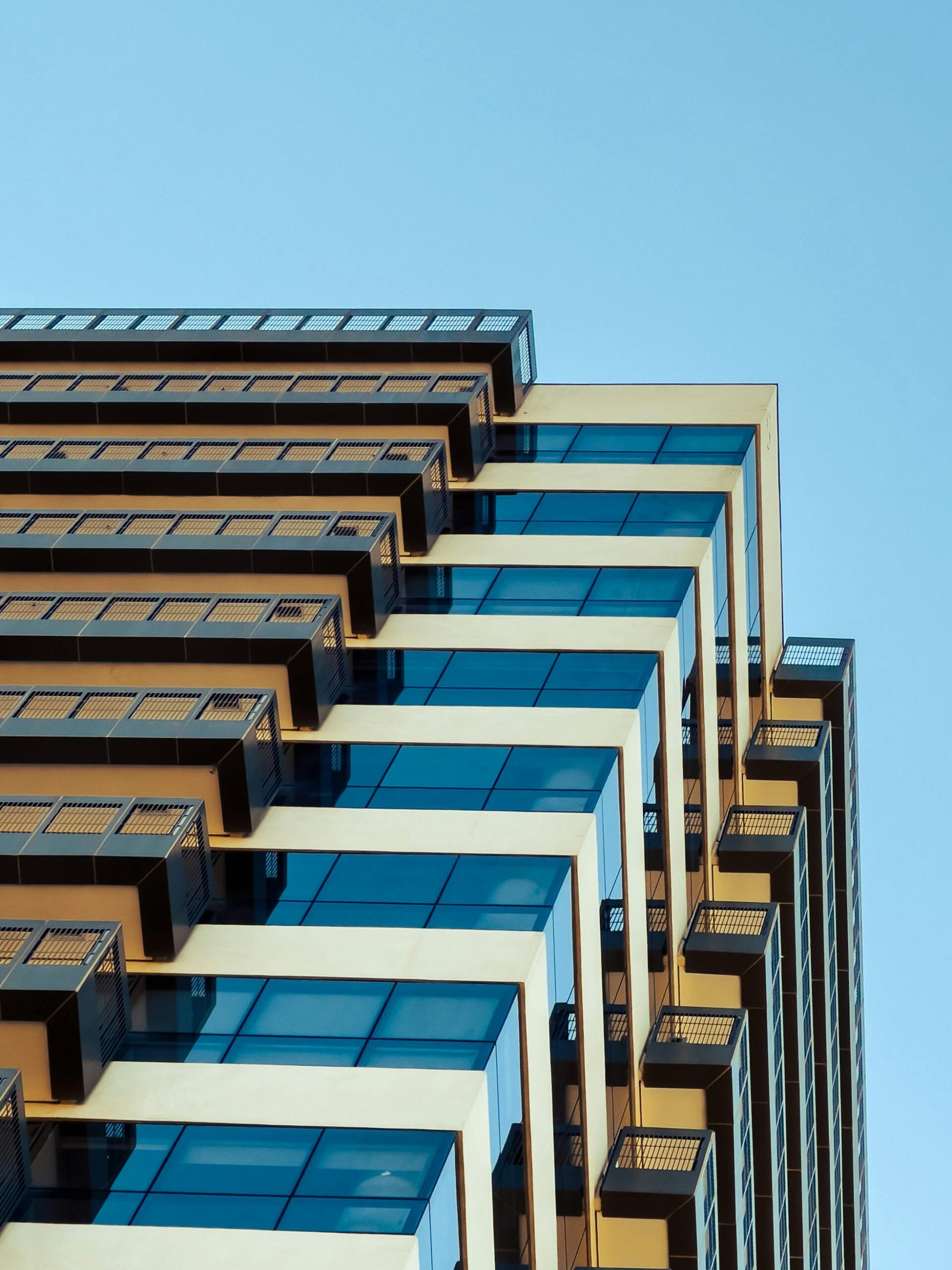 modern building, with different coloured parts, parts are dark orange and some white, used for an article about AIFMD
